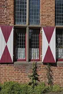 European Architecture Photos Prints: Brick wall with mullioned windows