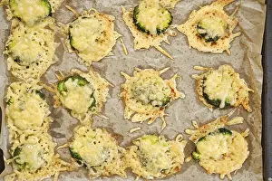 Baked Vegetable Recipes Prints: Broccoli pieces are smashed and spread on a baking sheet