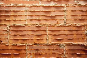 Deserted Concrete Structure Prints: Broken bricks in brickwall in wall restoration construction