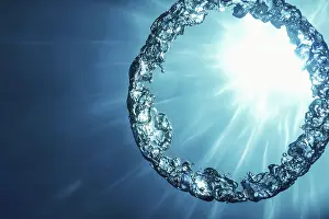 Deserted Underwater World Prints: Bubble Ring Underwater ascends towards the Sun
