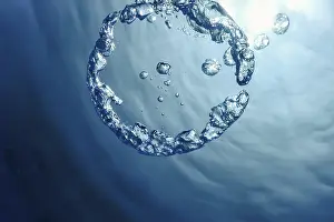Deserted Underwater World Prints: Bubble Ring Underwater ascends towards the Sun