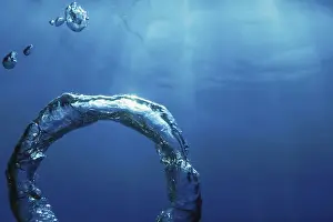 Deserted Underwater World Prints: Bubble Ring Underwater ascends towards the Sun