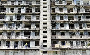 Residential Building Repair Prints: Builder at work on the restoration