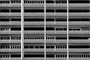 Exterior View Of A House Facade Prints: A building facade with a distinctive geometric pattern A building faade with a distinctive geometric pattern