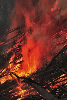 Wood Burning Embers Prints: Burning wood of an Easter fire