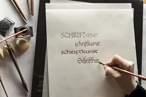 Traditional German Crafts Prints: Calligraphy studio, hand writes text with ink