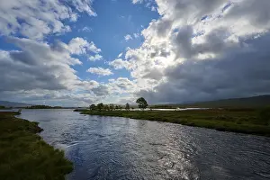Rannoch Moor Landscape Prints: A calm river under a partly cloudy