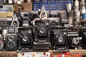 Prints of Camera, camera, retro, historical, flea market, one-eye, bellows, russian, many, several, in a row, in a line, background, illustration, USSR Flea Prints: Vintage Camera Print - USSR Flea Market Scene