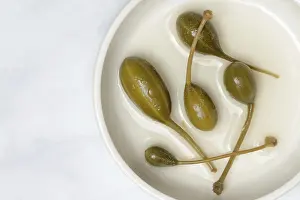 Capparis Spinosa Prints: Caper apples in shell, caper, caper fruit