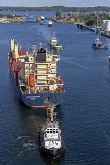Freight Transport Vessel Prints: Cargo ship waiting in front of the lock