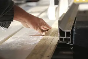 Carpenter At Work Prints: Carpenter at work in his carpentry workshop