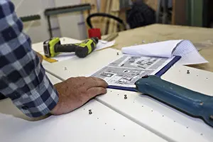 Carpenter At Work Prints: Carpenter at work in his carpentry workshop