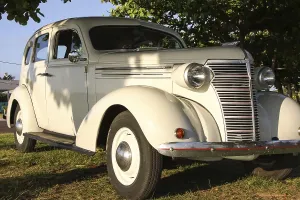 Historic Vehicle Images Prints: White Oldtimer in the evening sun