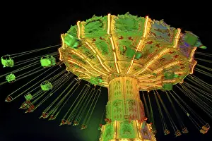 Deserted Evening Scene Prints: Chain carousel in the evening