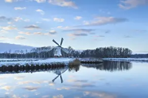 European Historic Landmarks Prints: Charming windmill reflected in river water