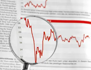Stock Chart Analysis Prints: Chart under a magnifier