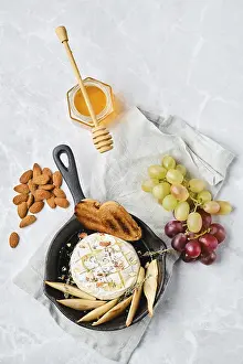 Fresh Fruit Platter Prints: A cheese platter on a light background