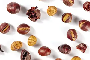 Bright Background Fruit Prints: Chestnuts, forming a frame for copy space