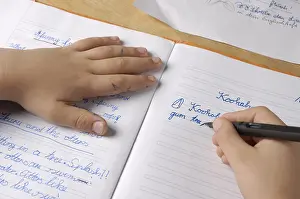 Schoolboy Education Prints: Child is doing his homework