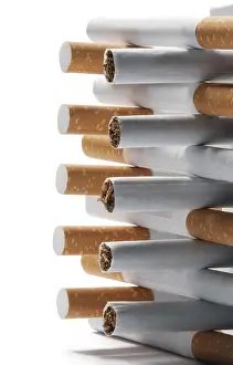 Bright Background Copy Space Prints: Few cigarettes lying on a white background