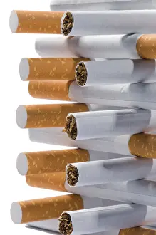White Background Copy Space Prints: Few cigarettes lying on a white background