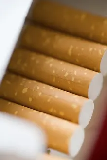 Smoking A Cigarette Prints: Cigarettes in an open cigarette packet