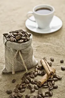 Spicy Drink Prints: Cinnamon and cup of coffee on sacking