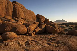 Evening Atmosphere In The Desert Prints: Cliff with rocks at Spitzkoppe