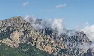 Southern Europe Mountains Prints: Cliffs and rocks in front of clouds