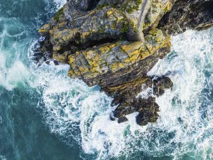 Top Down View Prints: Top Down over Cliffs and Waves from a drone