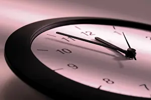 Studio Shot Of A Clock Prints: Clock - five to twelve