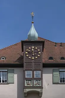 European Clock Towers Prints: Clock tower with figures from the trade