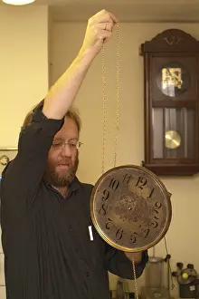 Watchmaker Profession Prints: Clockmaker restore clock