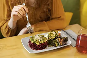 Diet Food Photography Prints: Close up hand holding fork