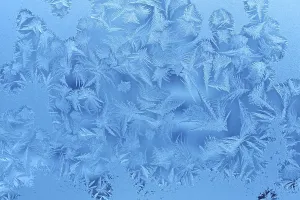 Deserted Window Scene Prints: Close up of ice patterns on winter glass texture