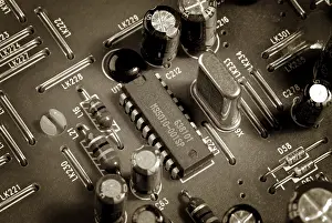 Studio Shot Technology Prints: Close up of a microchips and various electronic components on a circuit board