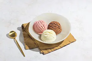 Vanilla Ice Cream Prints: A close up of three scoops of vanilla