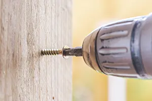 DIY Repair Tools Image Prints: Close up of screw and screwing machine, workshop