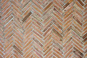 Deserted European Structure Prints: Close-up of a brick wall with a zigzag pattern