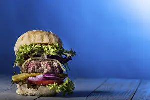 Unhealthy Food Options Prints: Close-up of a single cheeseburger