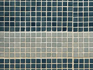 Urban Architecture Design Prints: A close-up view of a wall featuring a pattern of square tiles