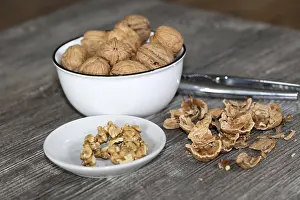 Rustic Wood Table Decor Prints: Close-up of walnuts on the table
