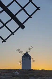 Evening Sun In Spain Prints: Close-up of a windmill at sunset with another one in the background