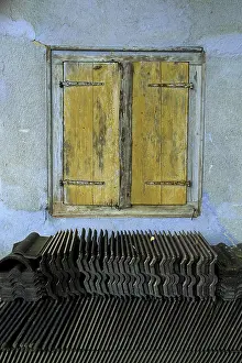 Old Roof Tiles Prints: Closed windows with shutters