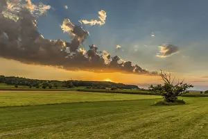 Deserted Evening Scene Europe Prints: Cloud atmosphere over meadows, sunset