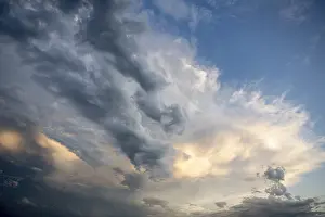Sunset Germany Prints: Cloud formation cumulus cloud (Cumulus) in front of sunset