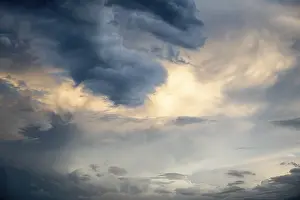 Cumulus Humilis Clouds Prints: Cloud formation cumulus cloud (Cumulus) in front of sunset