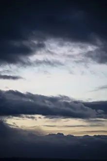 Deserted Evening Sky Prints: Cloud hole at sunset, bizarre clouds