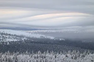 Cloudy Mountain Range Prints: Clouds over forested mountain ranges