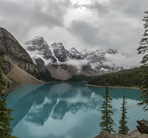 Mountainous Landscape Conservation Prints: Clouds hanging between the mountain peaks